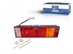 DT Spare Parts - Tail lamp, left, 24 V, P21W, R5W, L: 464 mm, H: 130 mm - 1.21246